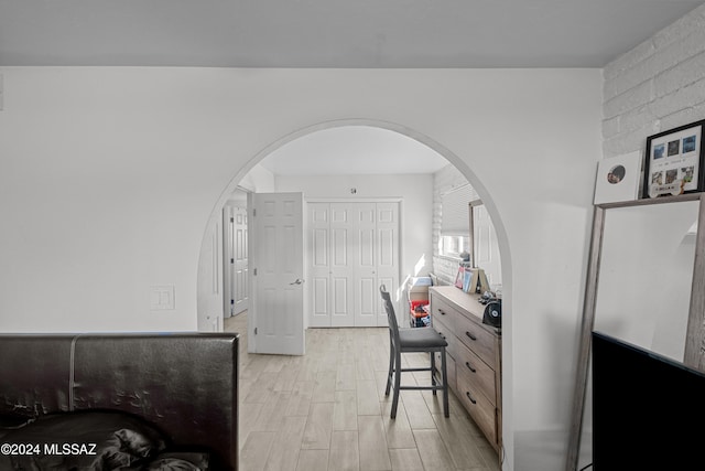 home office with light wood-type flooring