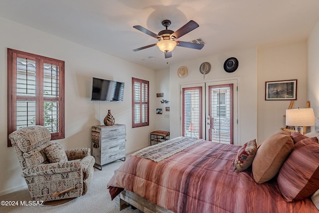 bedroom featuring ceiling fan, carpet floors, access to outside, and french doors