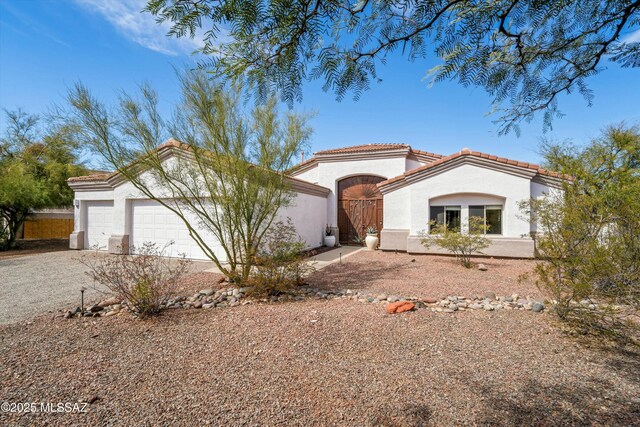 view of exterior entry featuring a garage