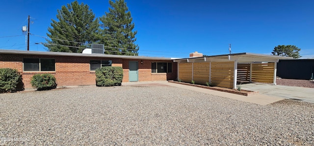 view of front of house with a carport