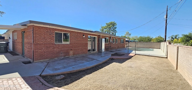 rear view of property with a patio area