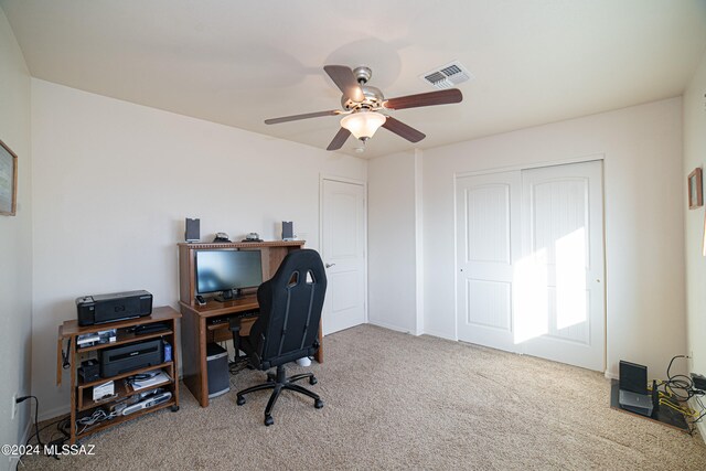 office featuring ceiling fan and carpet flooring