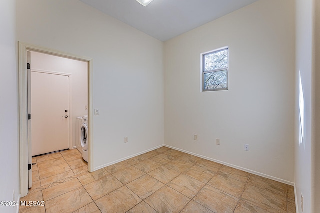 washroom with washer / clothes dryer