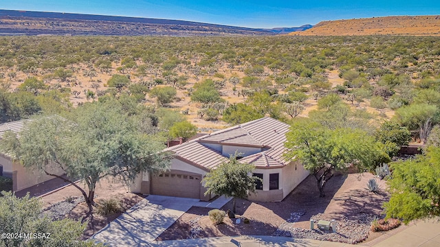 drone / aerial view featuring a mountain view