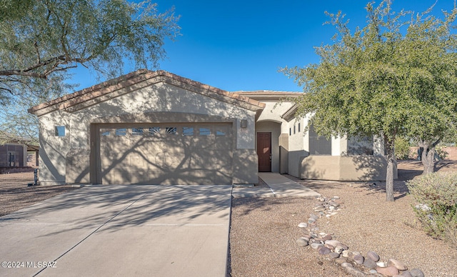 view of front of property featuring a garage