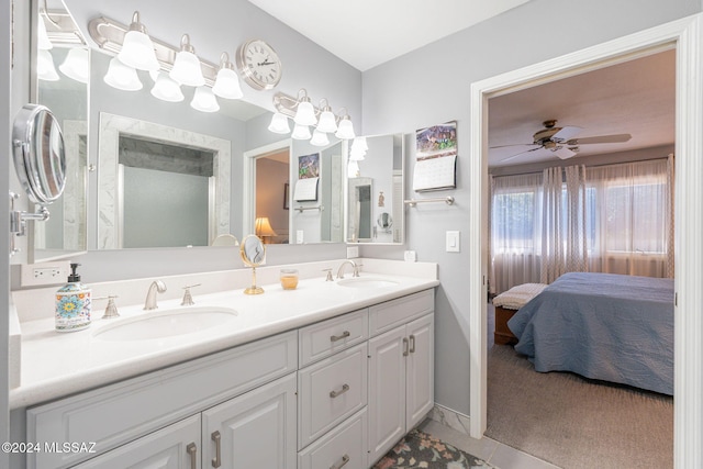 bathroom with tile patterned floors, ceiling fan, and vanity