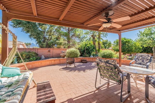 view of patio with ceiling fan