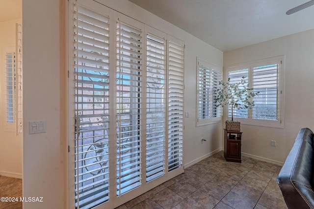 entryway featuring baseboards