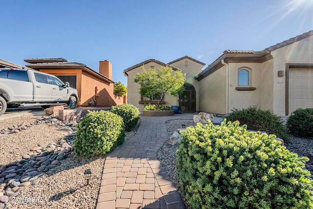 view of property exterior featuring a garage