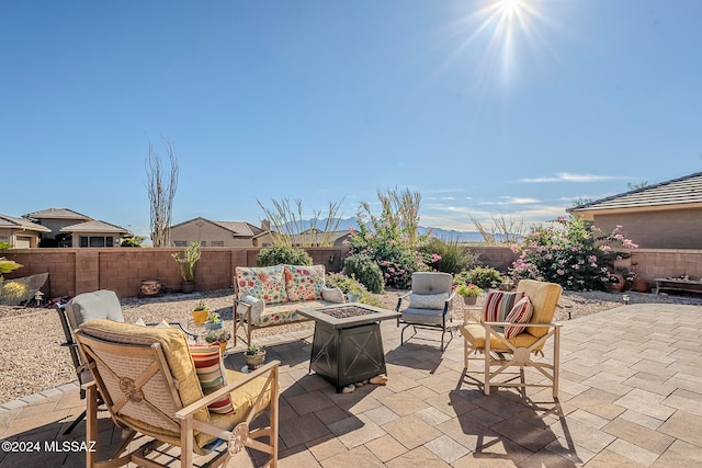 view of patio / terrace with a fire pit