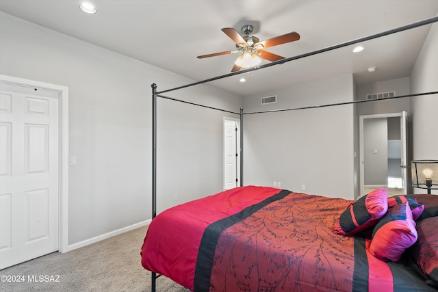 carpeted bedroom featuring ceiling fan