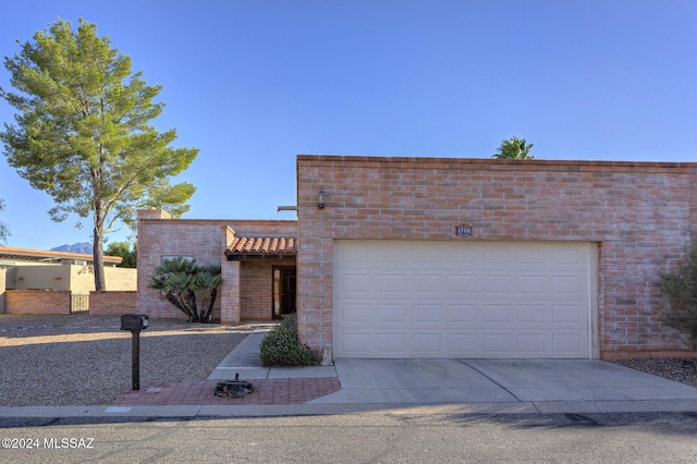 view of front of property with a garage