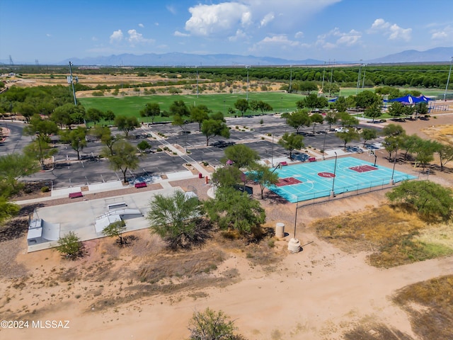 birds eye view of property featuring a mountain view