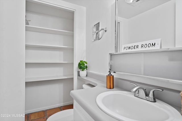 bathroom with vanity and tile patterned floors