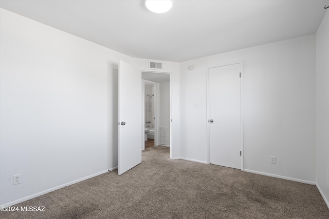 unfurnished bedroom featuring carpet floors