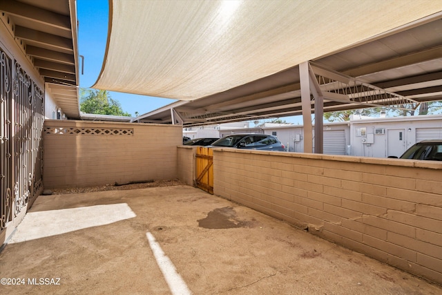 exterior space with a carport