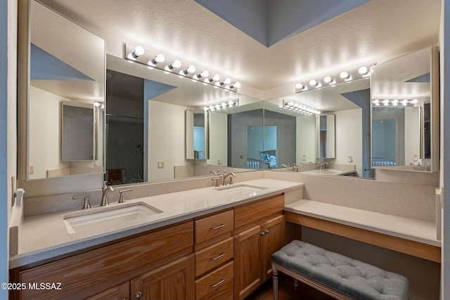 bathroom with double vanity and a sink