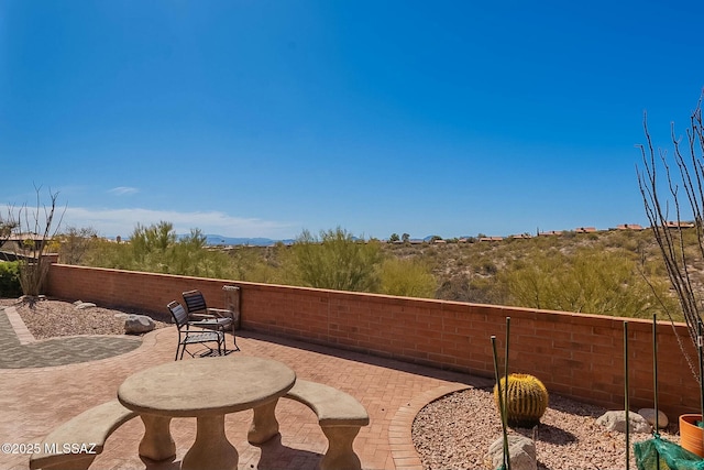 view of patio with fence