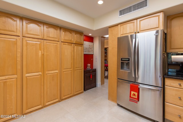 kitchen with stainless steel fridge with ice dispenser