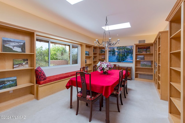 dining space featuring a chandelier