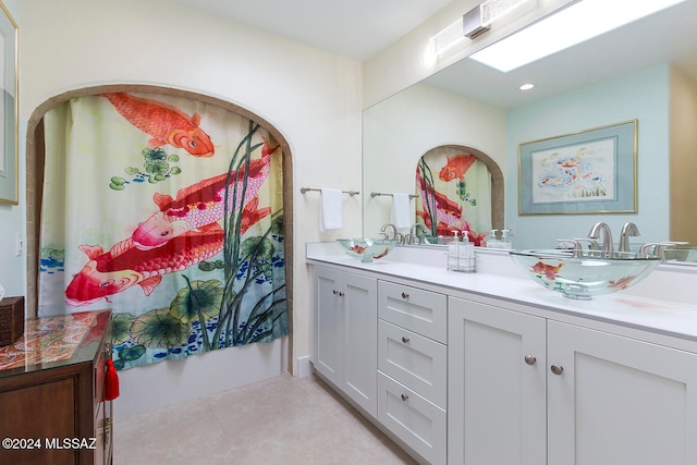 bathroom with shower / tub combination and vanity