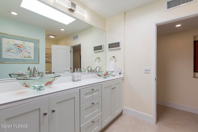 bathroom featuring vanity and tile patterned floors