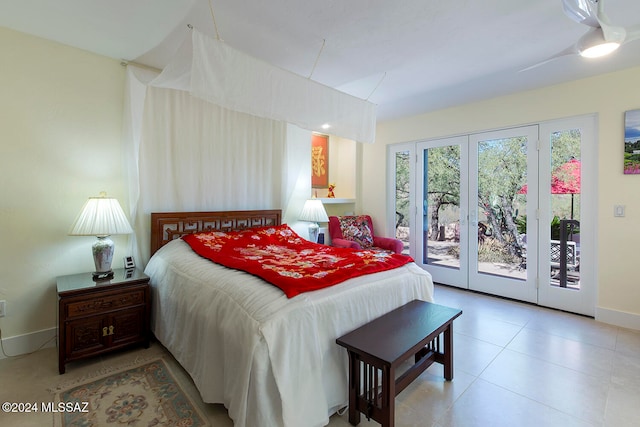 bedroom with access to outside, french doors, and ceiling fan