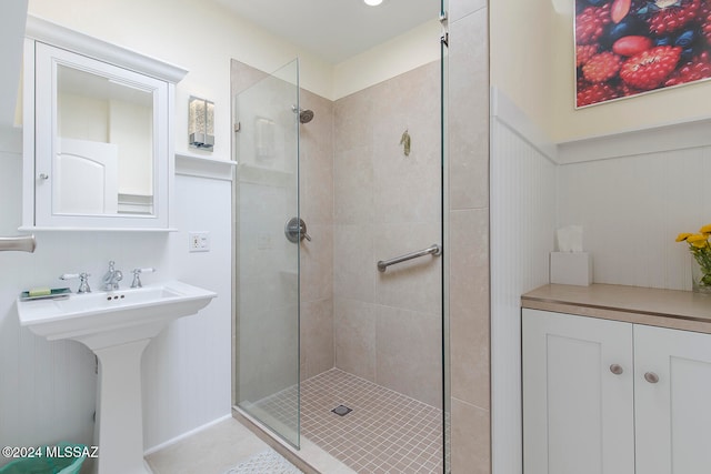 bathroom with tiled shower