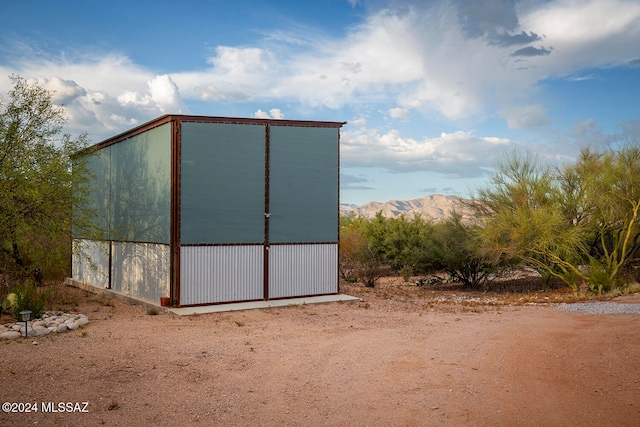 view of outdoor structure with a mountain view