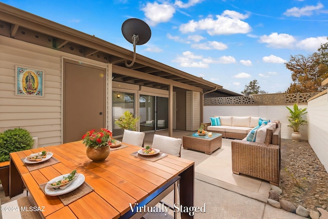 view of patio with an outdoor living space