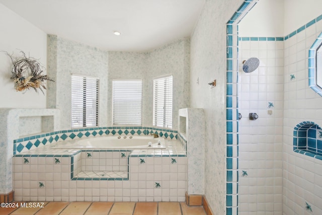 bathroom featuring separate shower and tub, tile patterned floors, and plenty of natural light