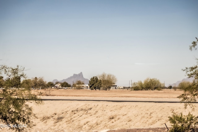 exterior space with a mountain view and a rural view