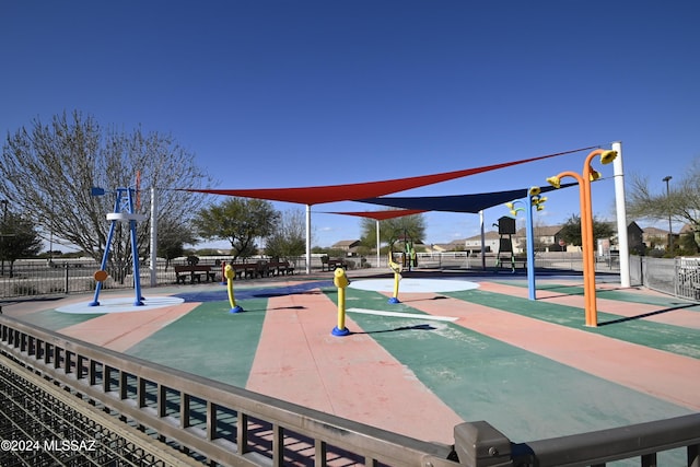 view of home's community with fence