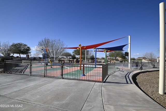 view of community with fence