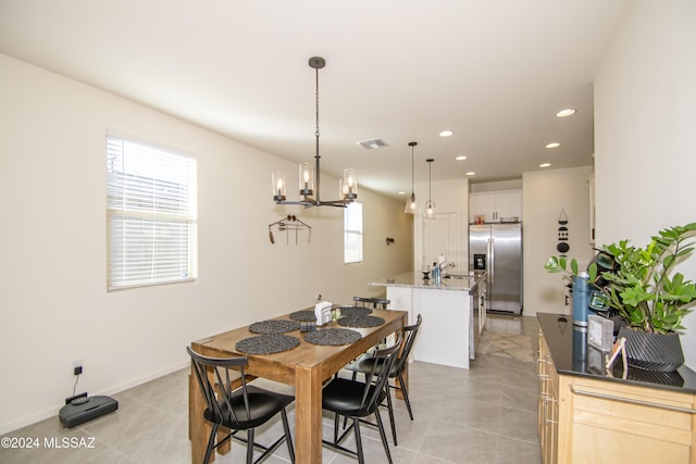 dining space with light tile patterned floors, baseboards, visible vents, and recessed lighting