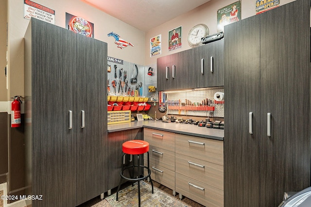 kitchen with dark brown cabinets