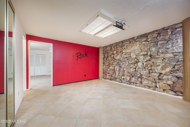 empty room featuring light tile patterned floors