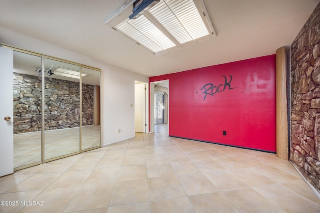 view of tiled spare room