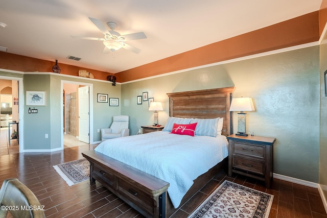 bedroom featuring arched walkways, visible vents, baseboards, a ceiling fan, and wood tiled floor