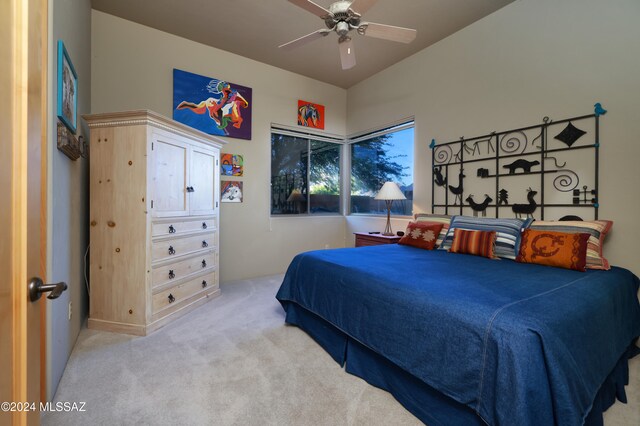bedroom featuring ceiling fan and carpet floors