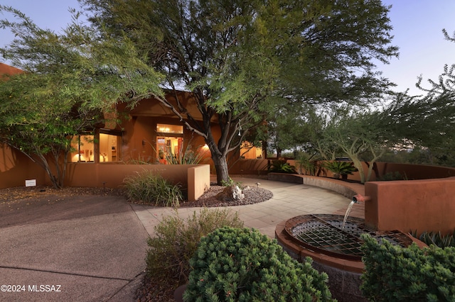 exterior space with a fenced front yard