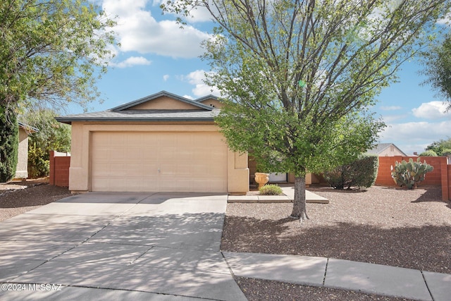 single story home with a garage