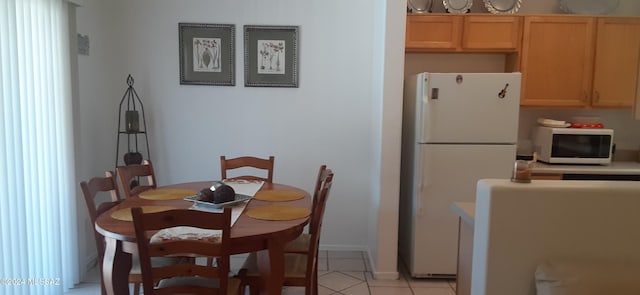 view of tiled dining room