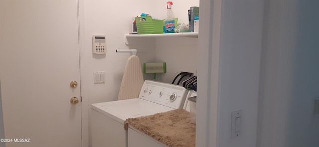 laundry room with washer and dryer