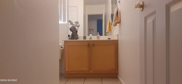 bathroom with vanity and tile patterned floors