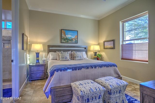 tiled bedroom with ensuite bathroom and crown molding