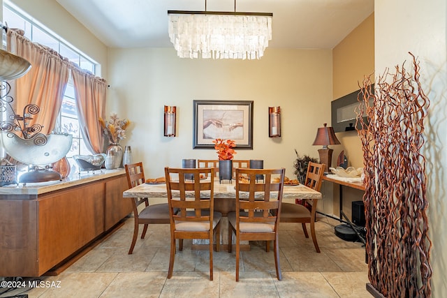 dining space with a notable chandelier