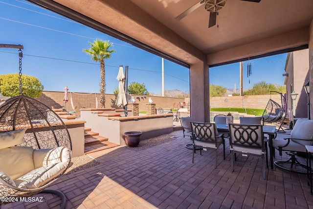 view of patio with ceiling fan