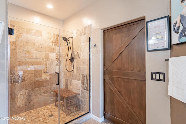 bathroom with a stall shower