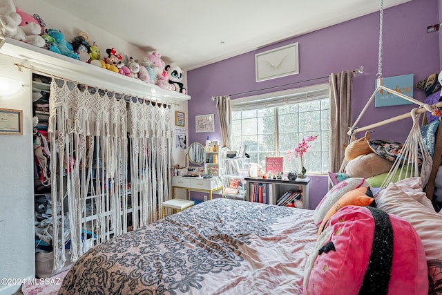 bedroom featuring vaulted ceiling